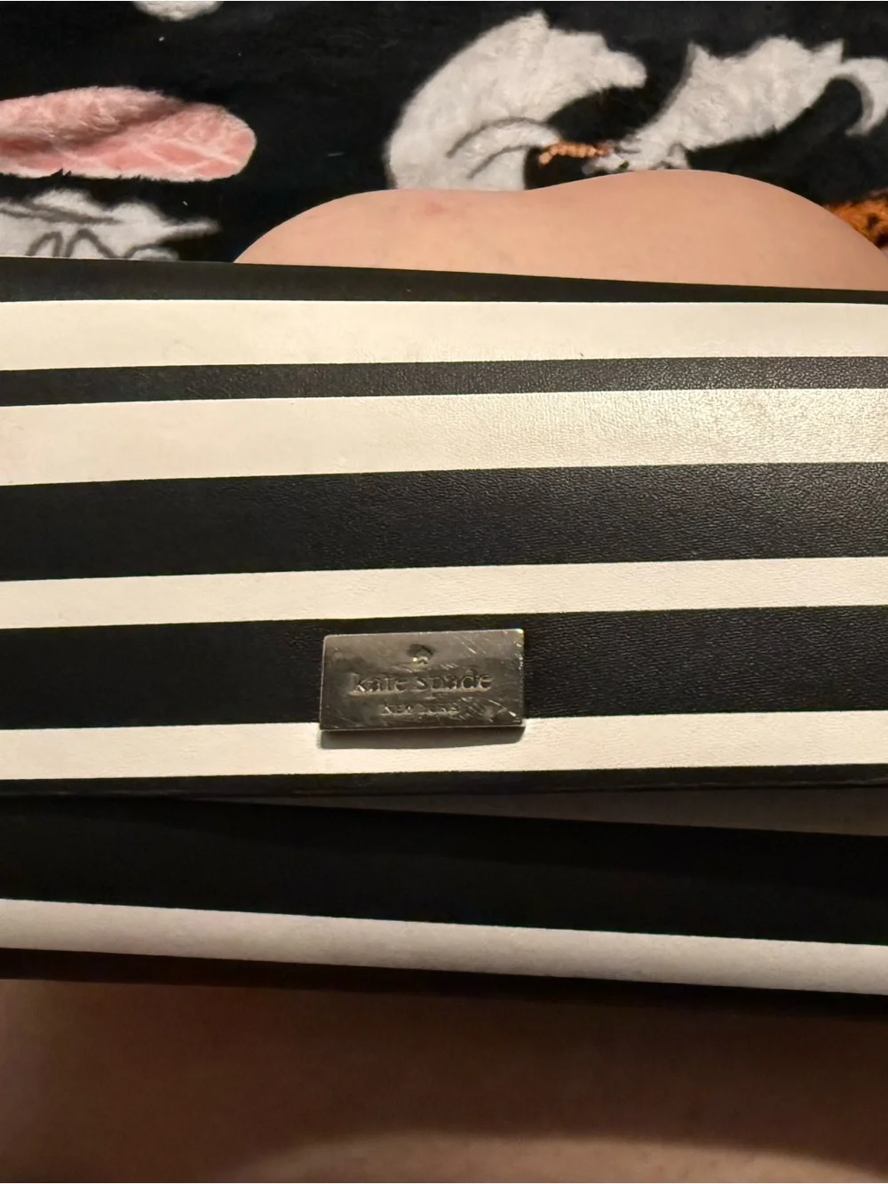 kate spade Black and White Striped Clutch with Logo Plaque